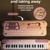 A pink electronic piano with a microphone is shown in two modes: storage and bracket.