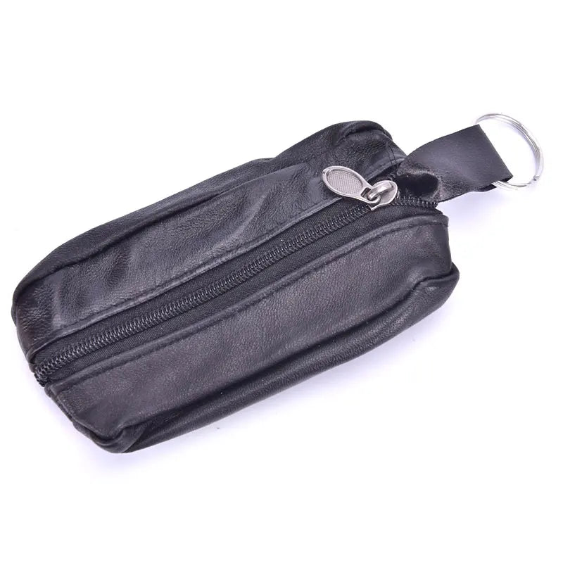 Black compact zippered coin purse with a key holder attached.