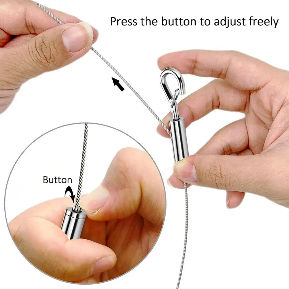Hands are adjusting a stainless steel wire rope with a hook to adjust freely