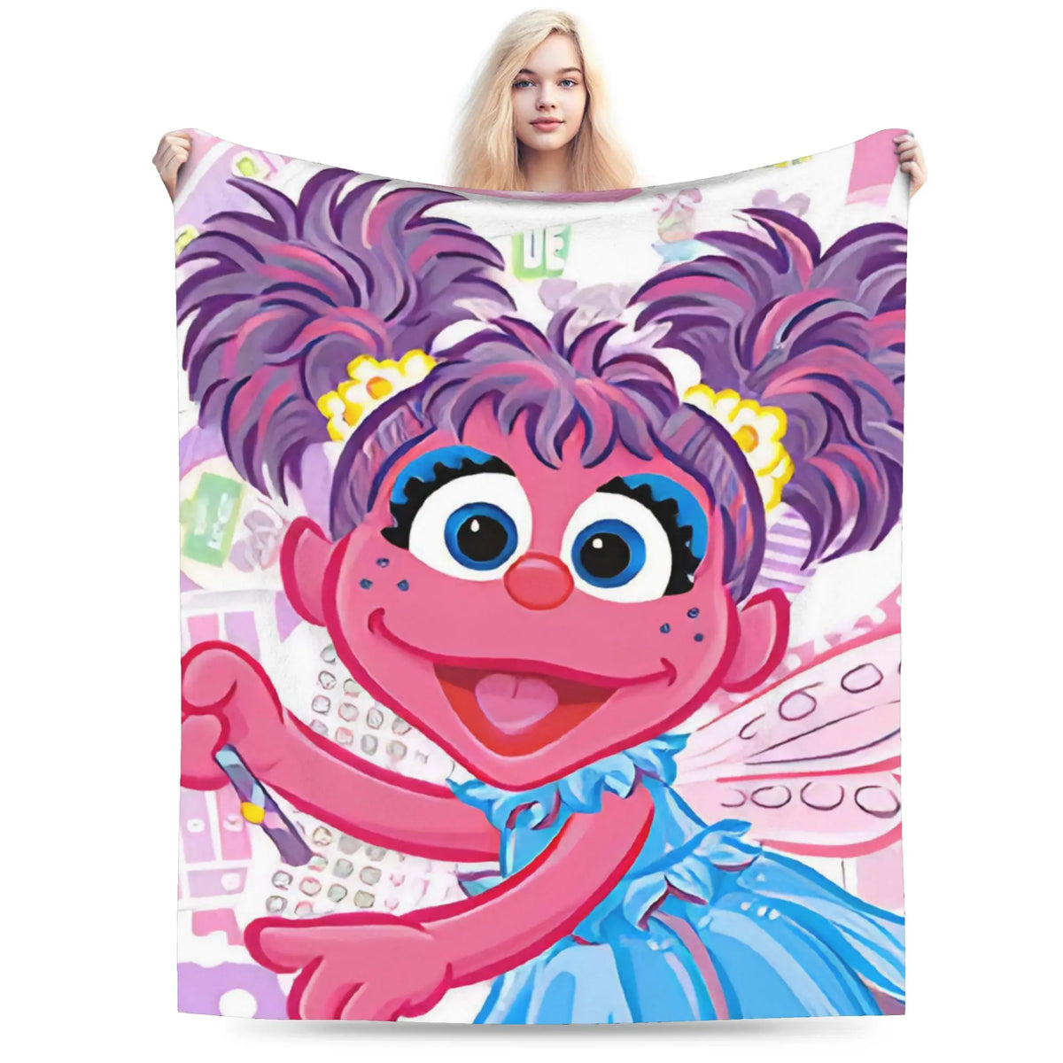A plush blanket featuring a cartoon character with pink skin and purple hair against a light background.