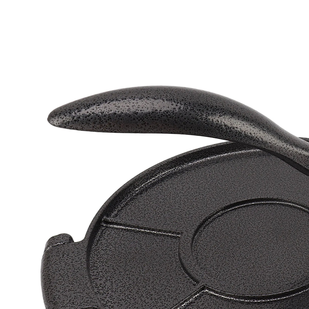 A close-up view of a black manual aluminum tortilla press with a curved handle and circular pressing plate.