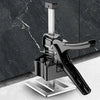 A black adjustable tile leveling lifter mounted on a silver base against a dark marble background.