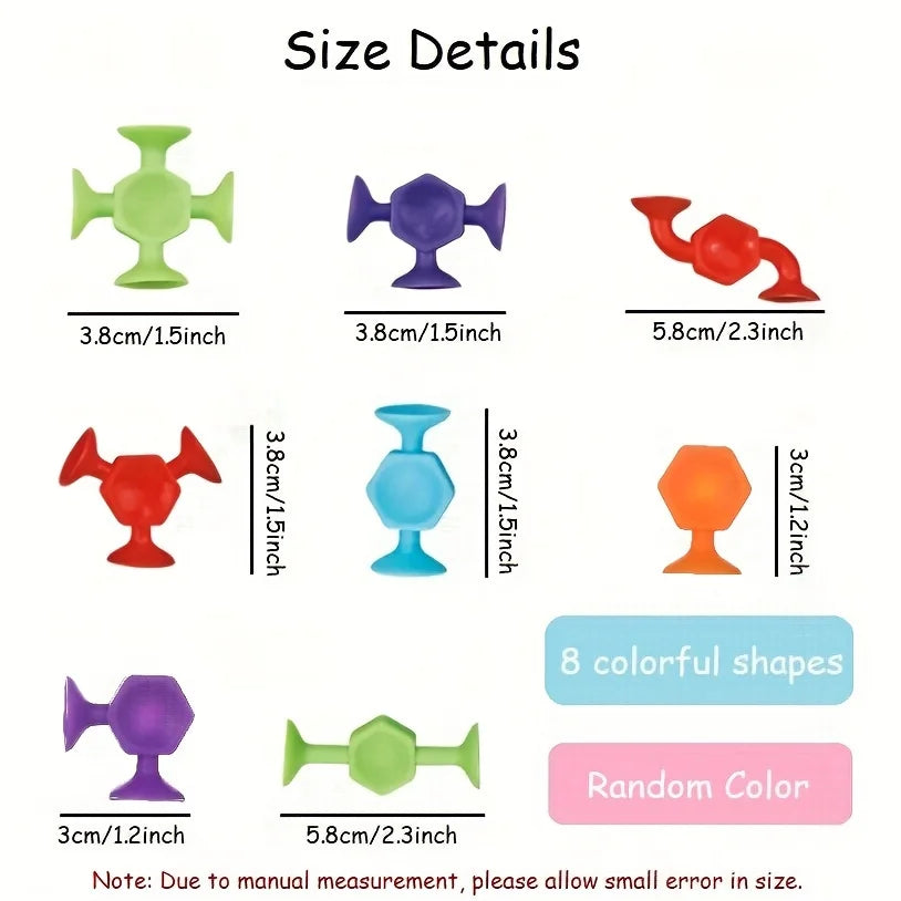 A display of various colorful silicone suction bath toys in different shapes and sizes.
