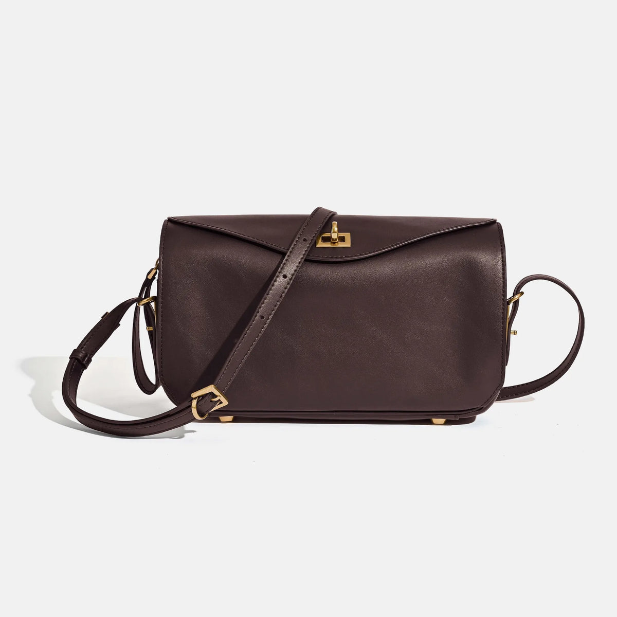 A dark brown genuine leather square crossbody bag with a gold lock and strap.