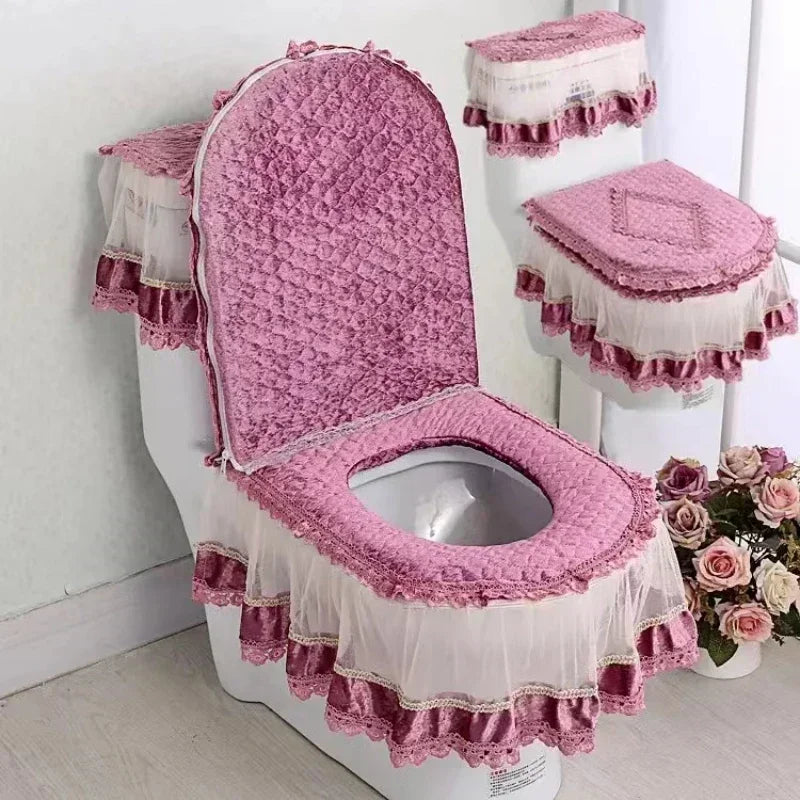 A pink antibacterial toilet seat cover set featuring a quilted cushion and lace trim.