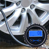A digital tire pressure gauge with a quick-connect air chuck is shown connected to a car wheel rim.