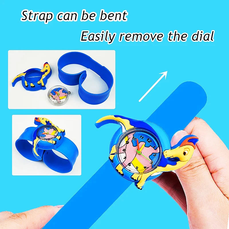A close-up of a kids' dinosaur digital watch with a blue silicone band being removed from the dial.