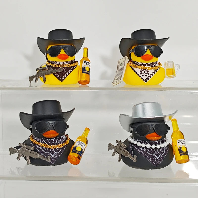Two yellow rubber duck cowboy ornaments with black hats and sunglasses, some holding bottles.