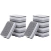 A set of stacked double-sided cleaning sponges with gray and white stripes.