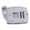 A white digital thermostat unit is shown open, displaying instructions to remove the battery holder and pull the wallplate of