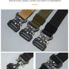 Close-up view of a black tactical nylon belt with multiple metal buckles and a textured finish.