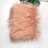 A fluffy pink faux fur fabric used for DIY sewing, doll hair, and cosplay.