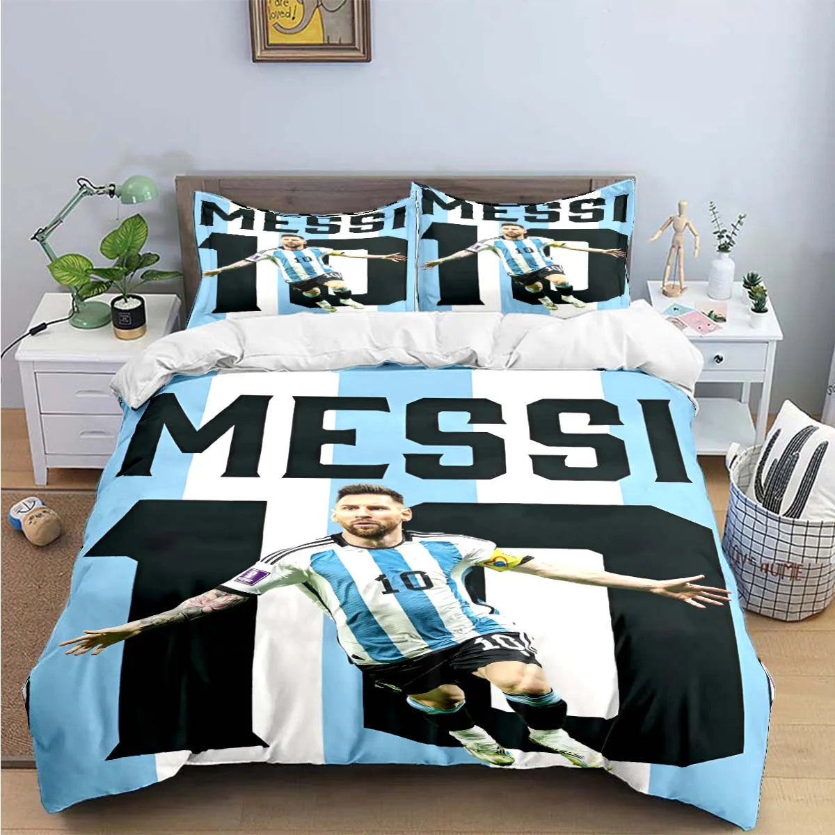 A blue and white duvet cover featuring a soccer player graphic with the word MESSI on it.