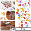 A mix of colorful acrylic crushed ice gems used for vase fillers and decor.