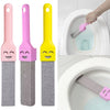 A set of three colored pumice stone toilet and bathroom cleaning brushes with handles in pink, purple, and yellow.