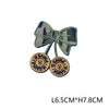 A dark green embroidered hunting patch featuring a bow and two circular patches on a fabric background.