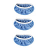 Three blue fuzzy reusable mop pads with white trim shown from above