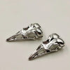 A set of five silver gothic skull and crow head charms for jewelry making