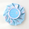 A light blue fabric pack with a circular label that reads We're animal super featuring a white bunny design.