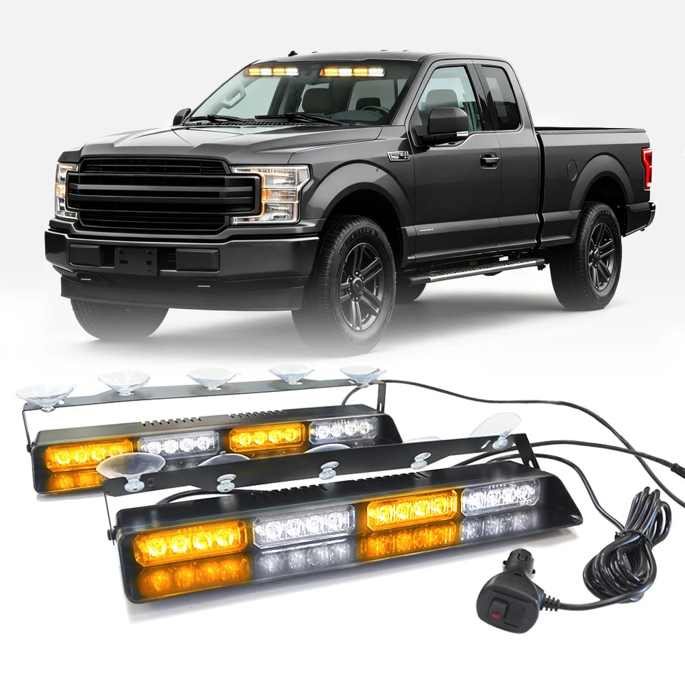 A black Ford pickup truck with aftermarket emergency dash strobe lights installed on the front grille.