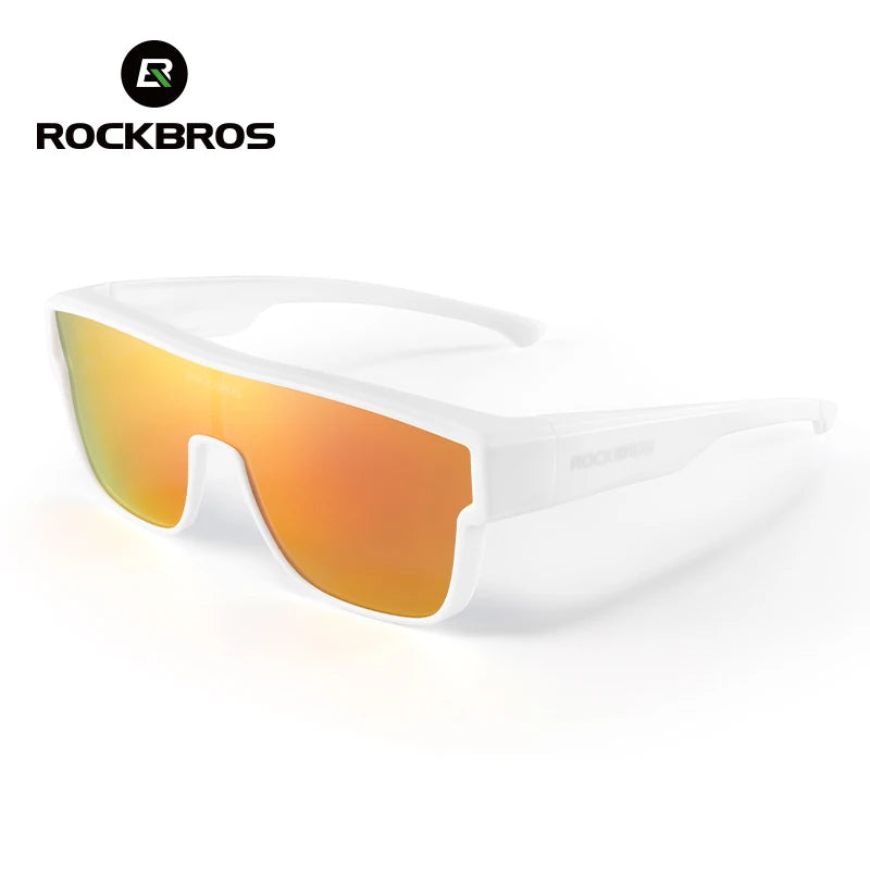 A pair of white frame sunglasses with orange-tinted lenses shown against a white background.