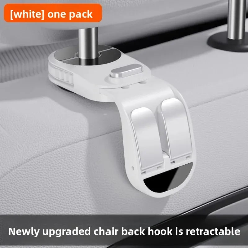 A white retractable chair back hook is shown attached to a car seat, demonstrating its hidden storage feature.