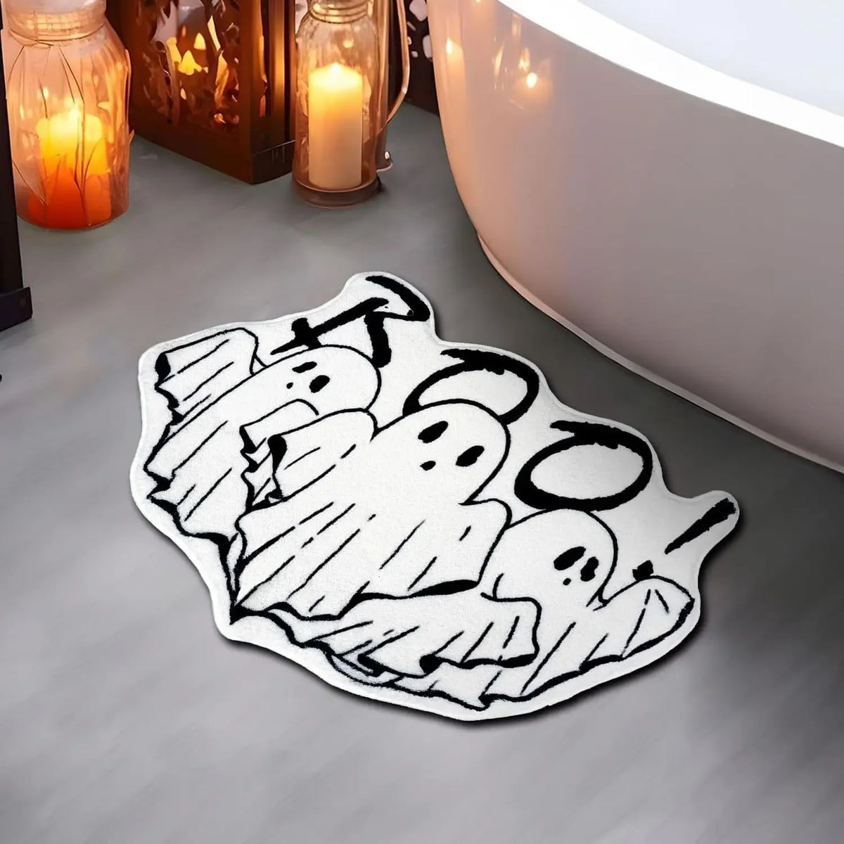 A black and white line art rug featuring multiple ghost designs and spider webs.