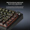 Close-up view of a multi-functional metal knob on a black mechanical keyboard with various function keys visible.