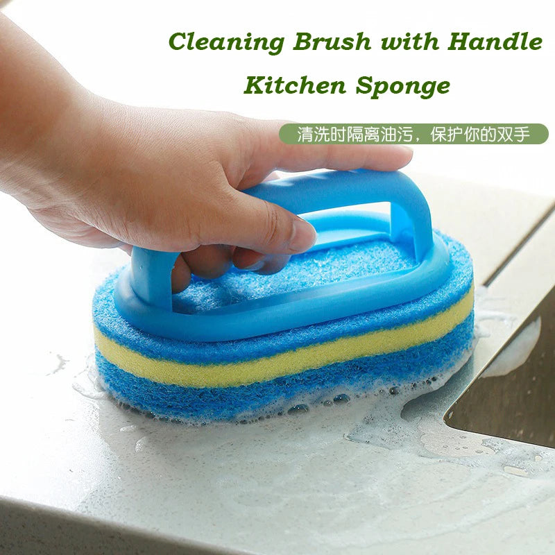 A hand is holding a blue and yellow kitchen sponge cleaning brush with an ergonomic handle on a countertop.