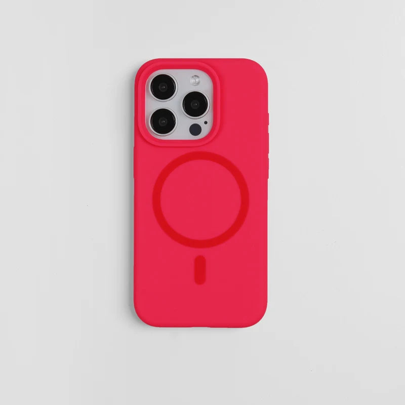 Coque de téléphone en silicone rose vif avec une découpe circulaire à l'arrière.