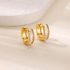 Boucles d'oreilles créoles en zircon cubique ton or