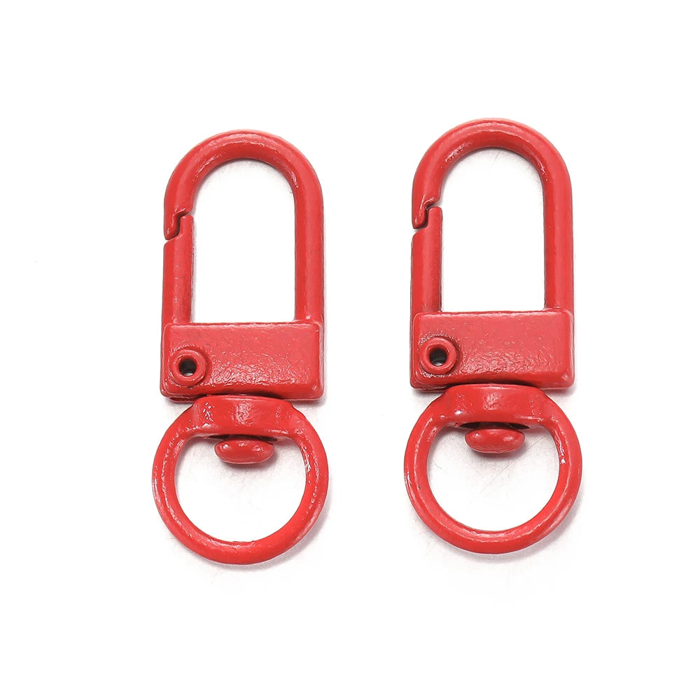 A pair of red alloy lobster clasp hooks for DIY jewelry making.