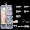 A clear plastic kit containing various tools and components for repairing glasses, including nose pads, screws, and precision