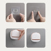 Hands are shown interacting with a wall-mounted ABS soap dish and lid, demonstrating its placement.