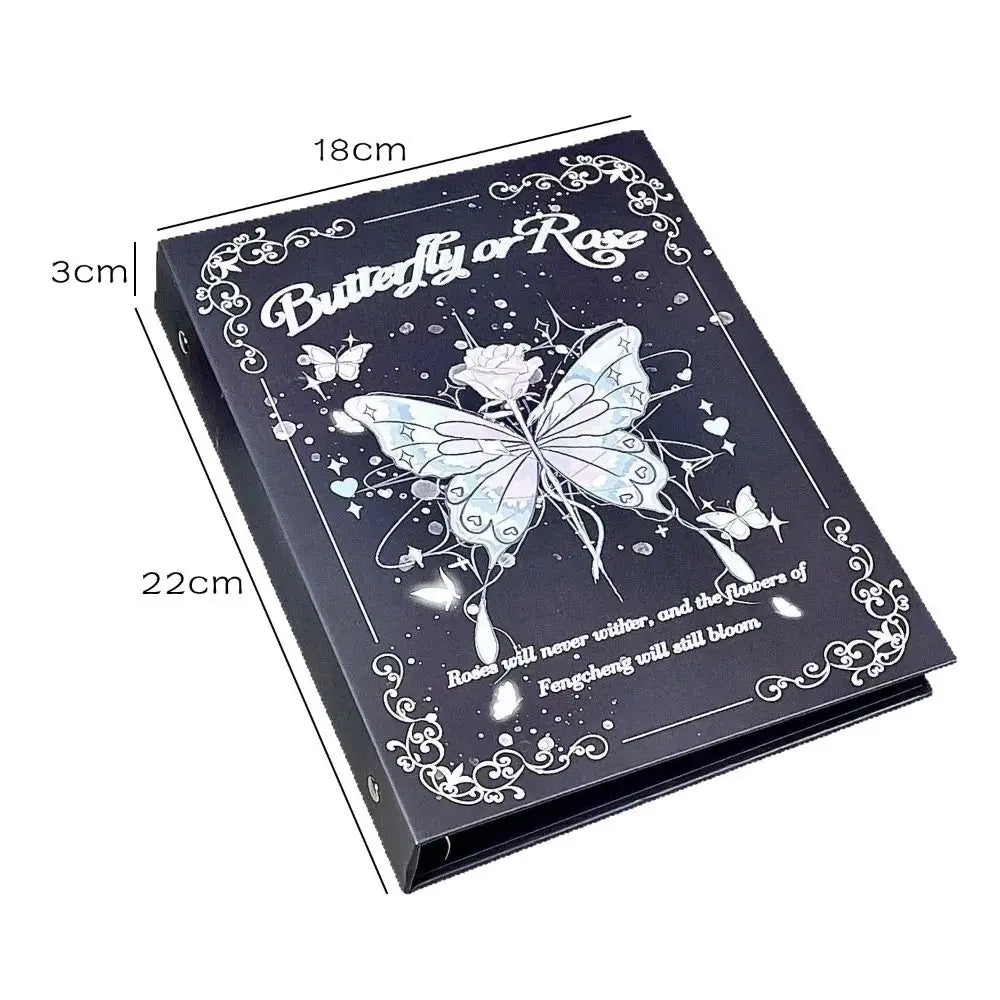 A black photo album with a butterfly or rose design featuring delicate floral illustrations and measurements.