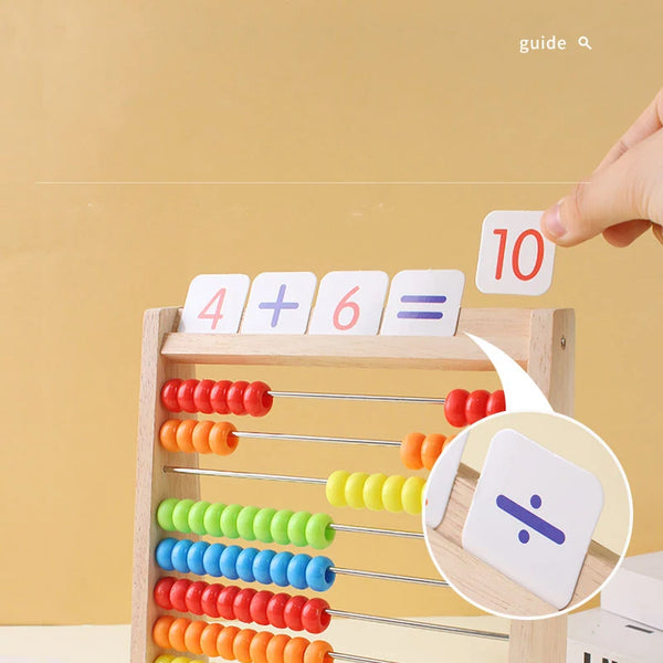 Wooden rainbow counting abacus showing various colored beads and mathematical operations