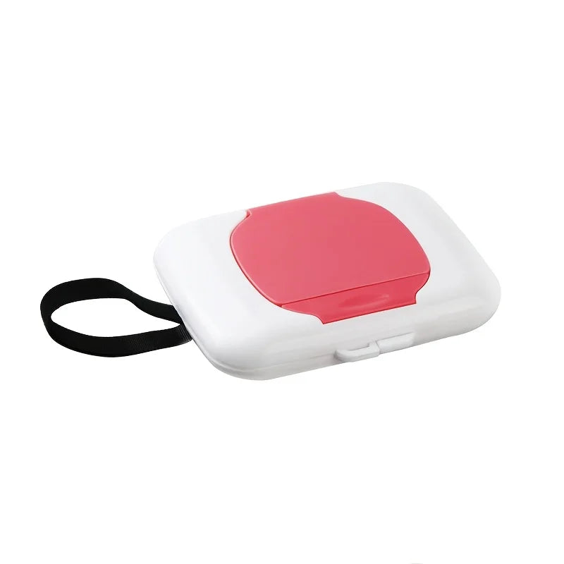 White refillable wipe dispenser box with a pink lid and black strap.
