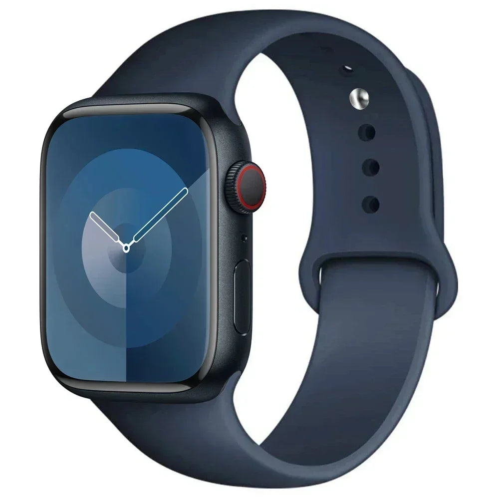 A dark blue silicone sport band for an Apple Watch shown on a wrist.