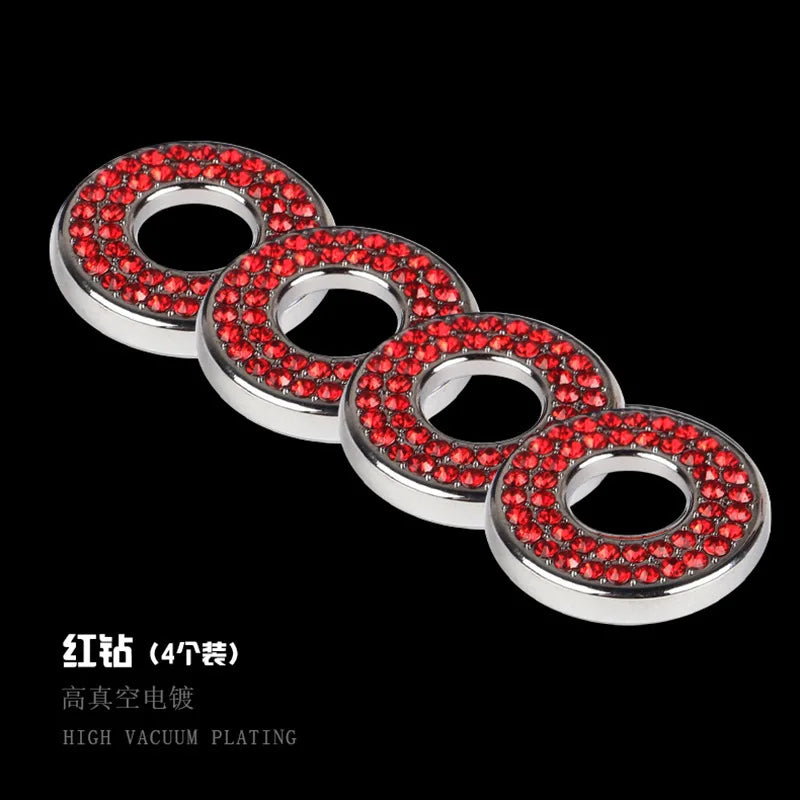 A set of four crystal rhinestone car door lock pull covers with silver metal rings.