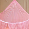 Pink installation-free dome mosquito net covering a single bed area