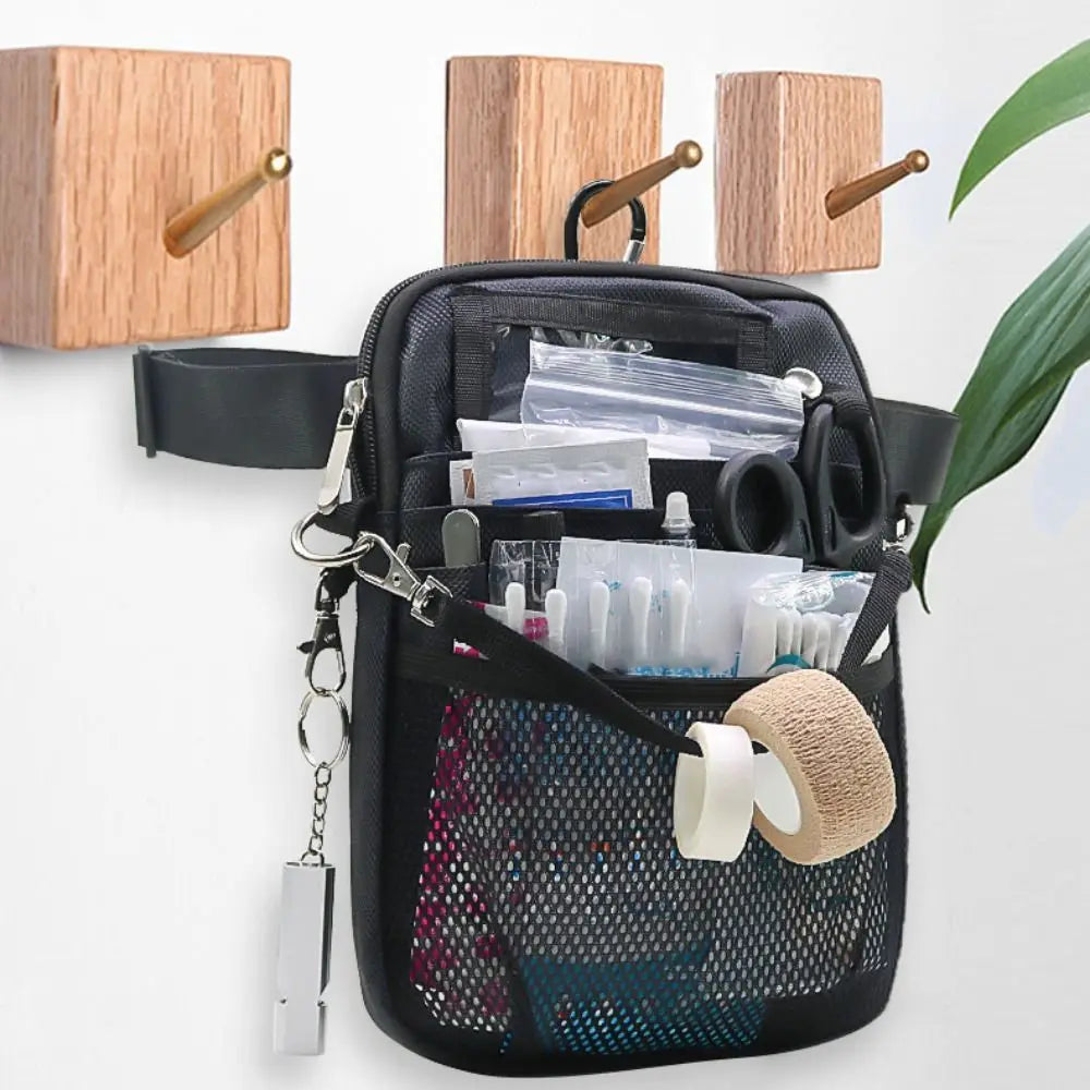 Black multi-pocket crossbody fanny pack with wooden pull tabs and various medical supplies inside