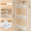A beige wall-mounted clip storage rack with multiple double-layer clips for laundry drying.