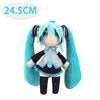 A soft blue Hatsune Miku plush doll with long hair and a black outfit.