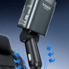 A close-up of a dark gray car charger securely plugged into a cigarette lighter socket, demonstrating a firm connection.