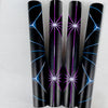 A set of four black tubes featuring luminous purple and blue star patterns for self-adhesive wallpaper.