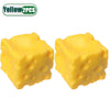 Two yellow squishy stress relief toys shaped like cubes with dimples