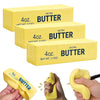 Three yellow butter fidget toys in boxes and a hand squeezing one