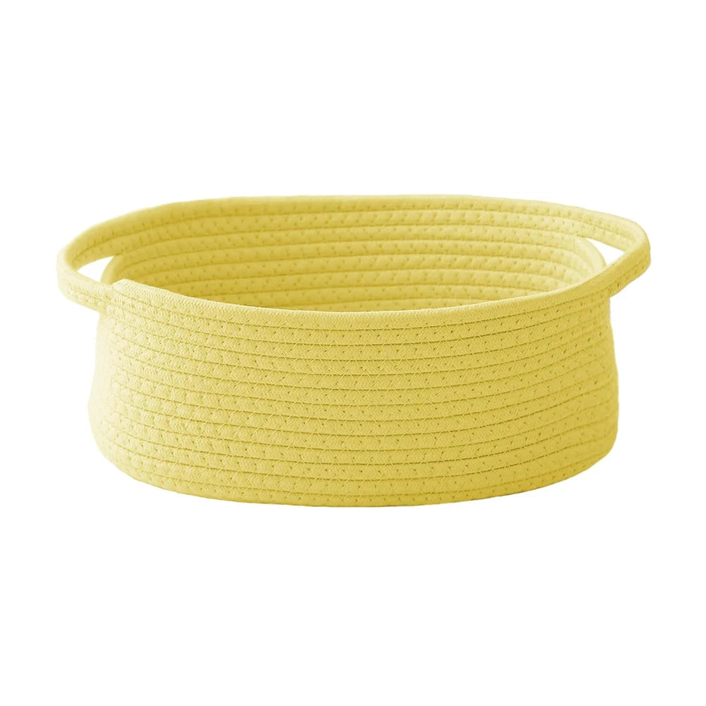 Handwoven rope storage basket in yellow with handles