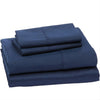 A stack of dark blue microfiber bed sheets folded neatly for a hotel luxury set.