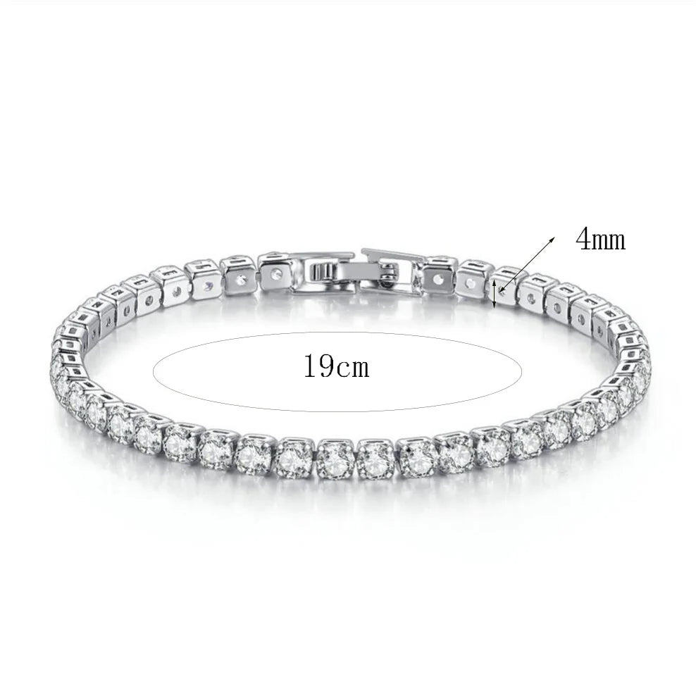 A close-up view of a tennis bracelet and bangle set featuring clear cubic zirconia stones on a silver-toned chain.